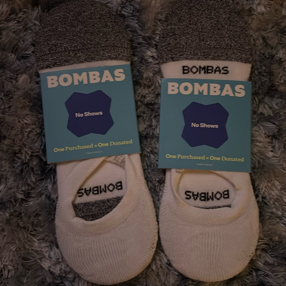 Bomba socks. New. Size large. Bought wrong size. Each pair $9.
